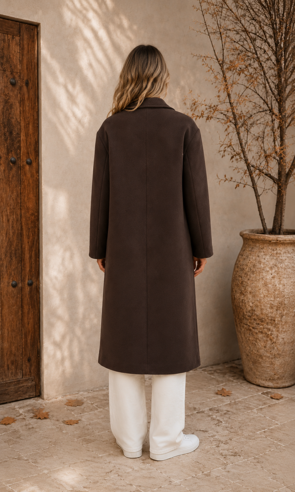 Brown oversized women's coat back view with back vent