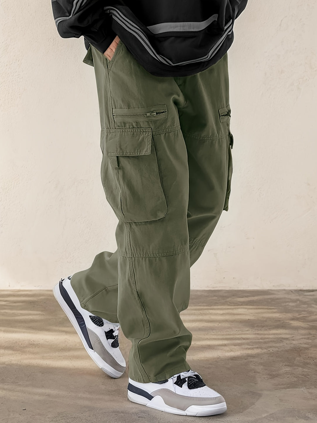Men's full-length cargo trousers with woven cotton-blend construction and functional multi-pocket design