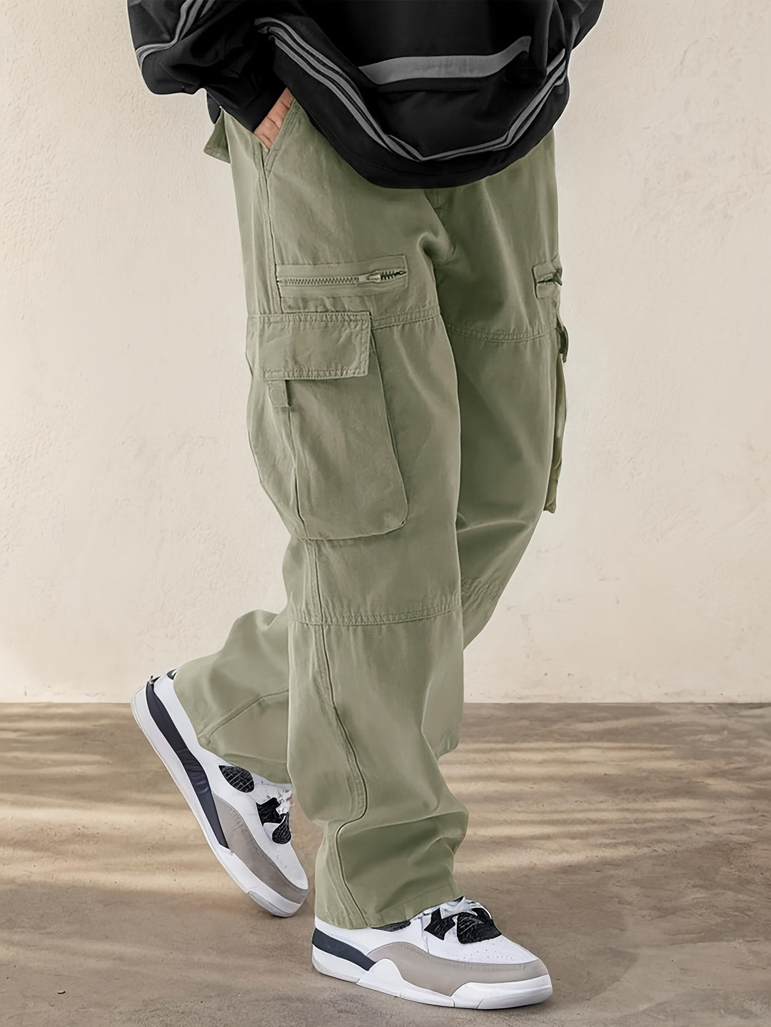 Men's regular-fit woven cargo trousers with side and flap cargo pockets for everyday styling