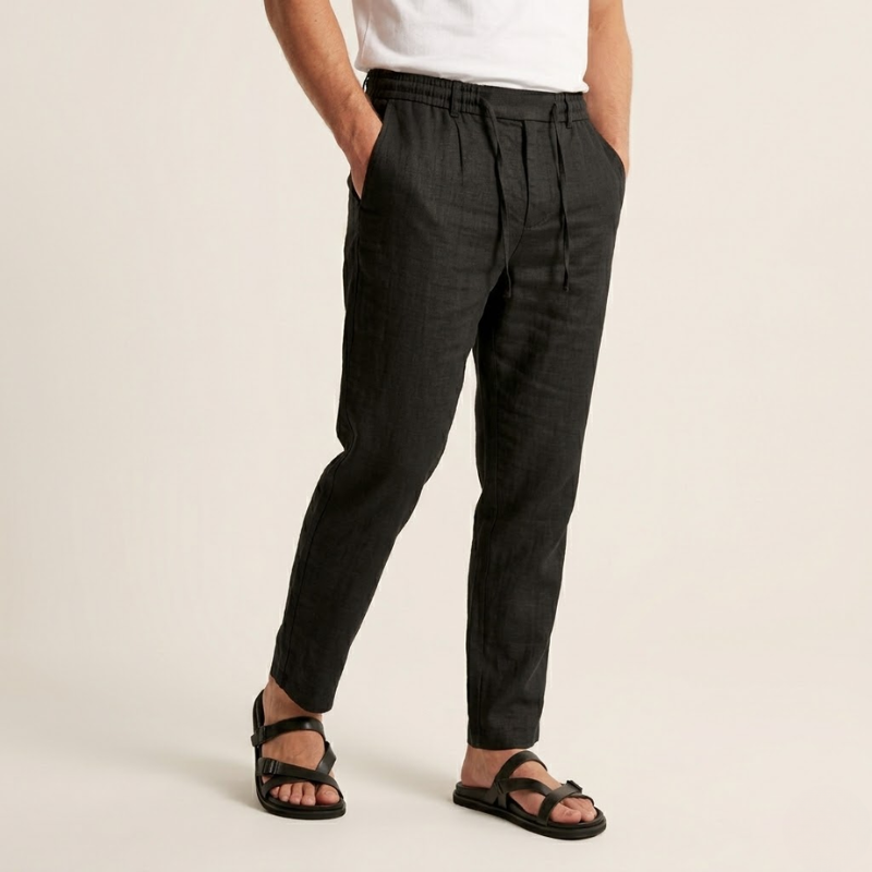 Men's tapered pants with adjustable drawstring waist and clean seam detail