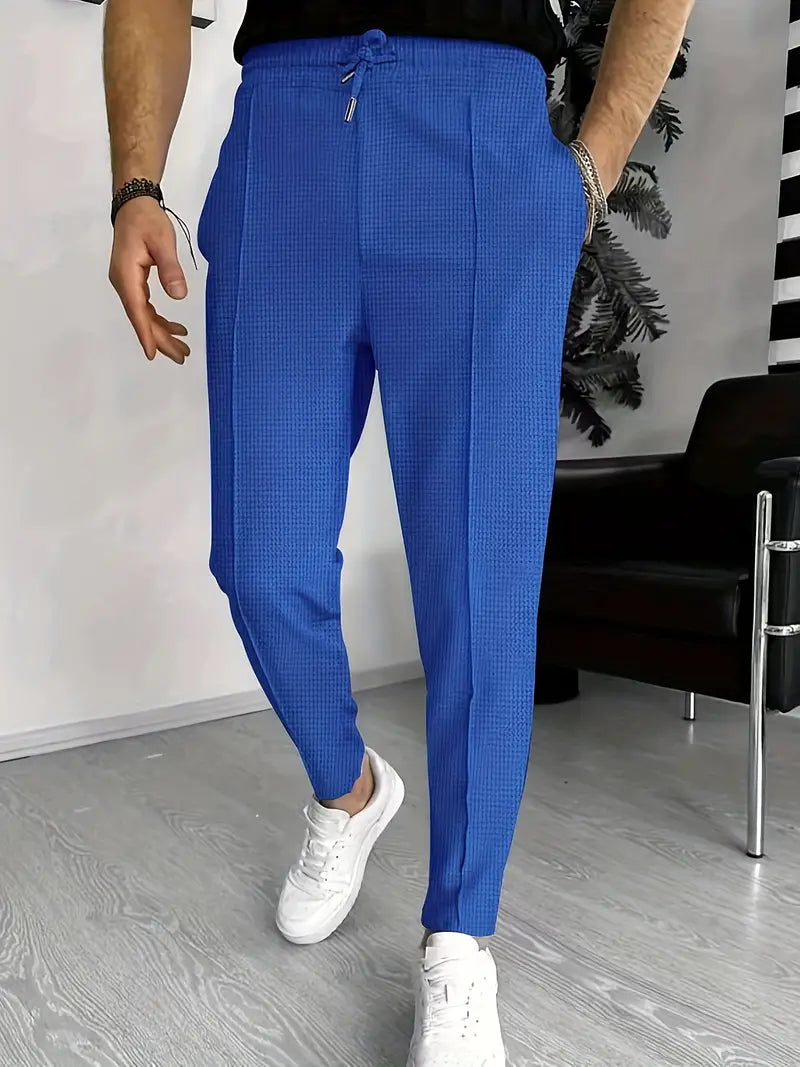 Men's textured drawstring trousers with vertical seam detail