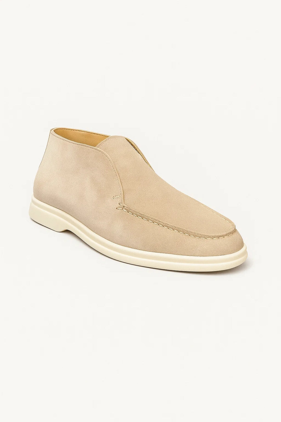 Men's slip-on suede chukka boots featuring a structured low-ankle silhouette and smooth flat sole