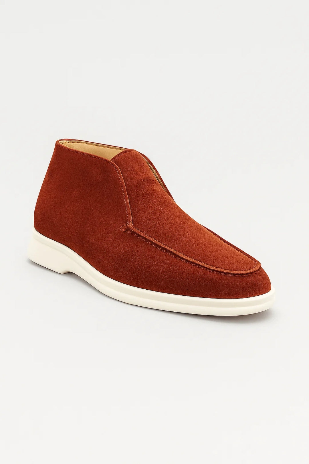 Men's suede slip-on chukka boots with stitched seam construction and a clean rounded toe