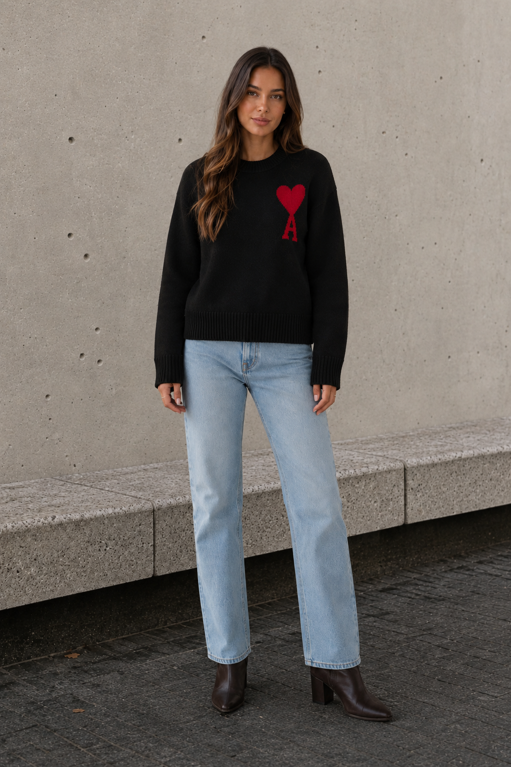 Women's black oversized sweater with heart and letter detail front view