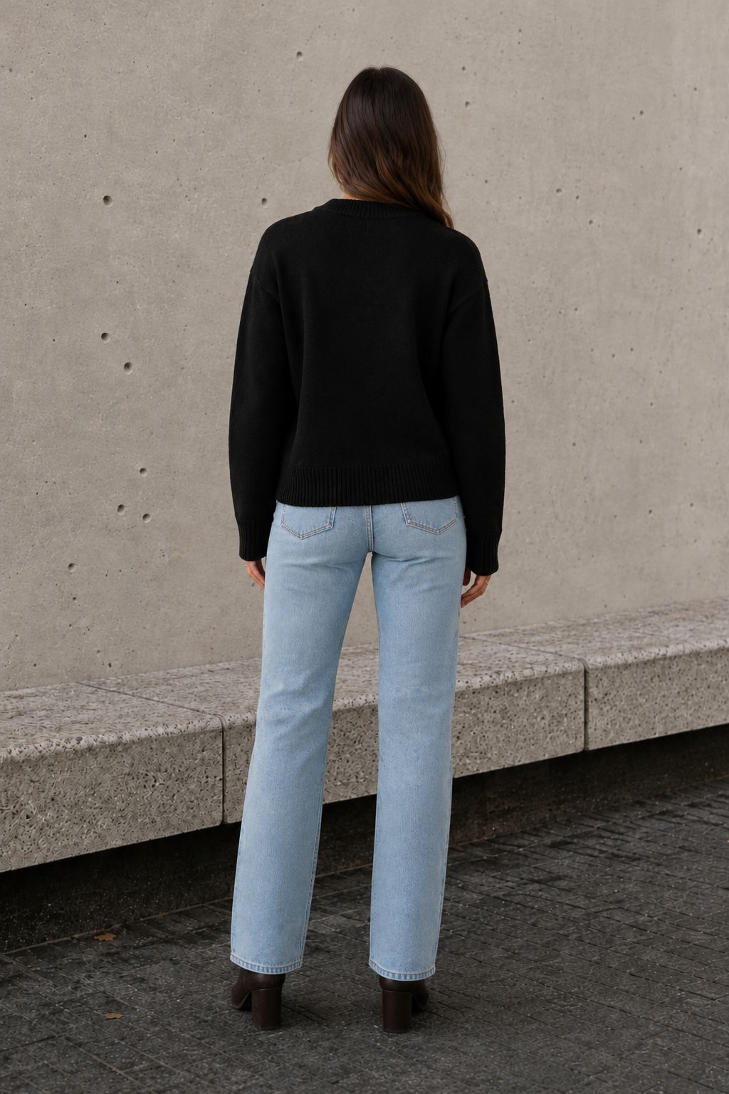 Women's black oversized sweater back view with relaxed fit