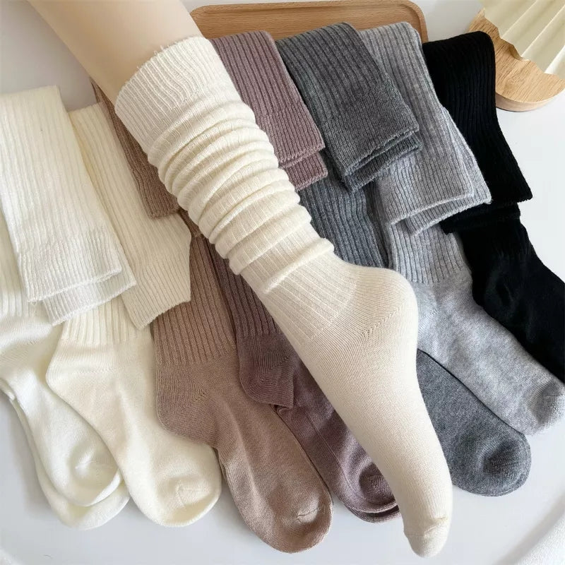 Women's knitted socks with a ribbed shaft and smooth foot section