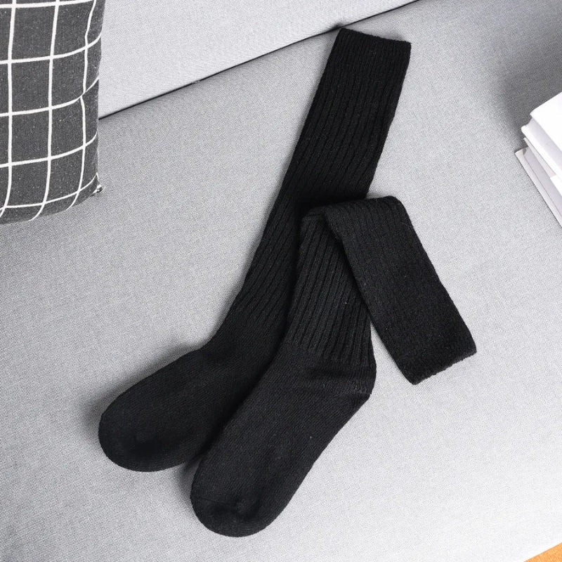 Women's knit socks with a ribbed upper shaft and smooth foot section