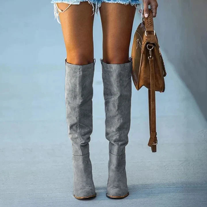 Women's pull-on knee-high boots with block heel, side profile view