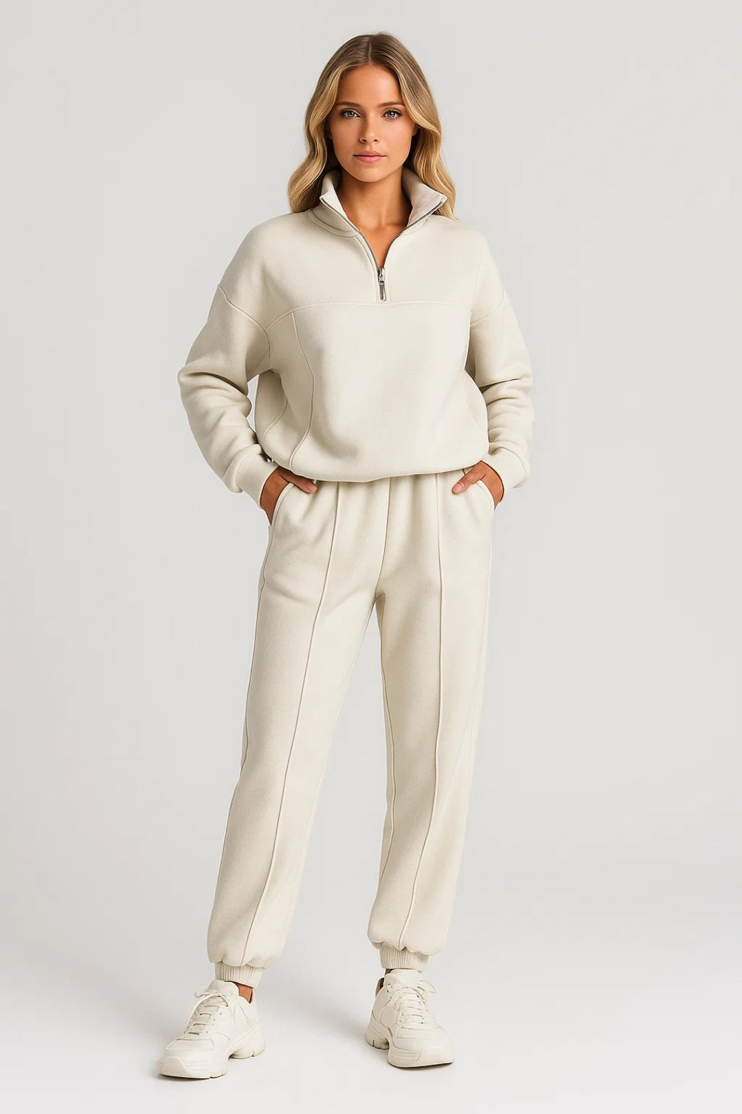 Women's half-zip top and tapered jogger pants set with high collar and elastic cuffs