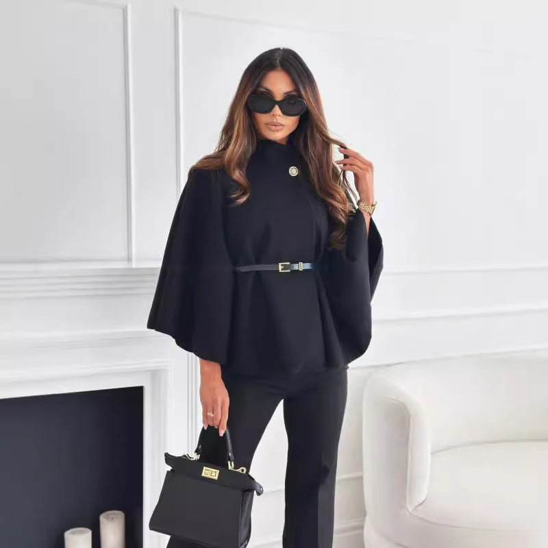 High-collar women's knit top with button detail and belted waist