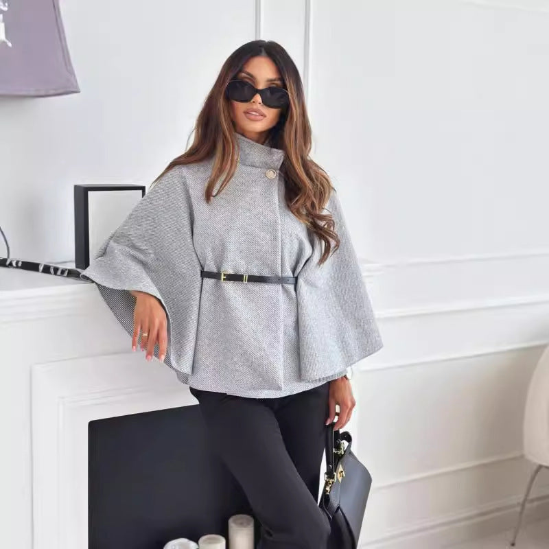 Women's relaxed-fit knit top with high collar, three-quarter sleeves, and removable belt