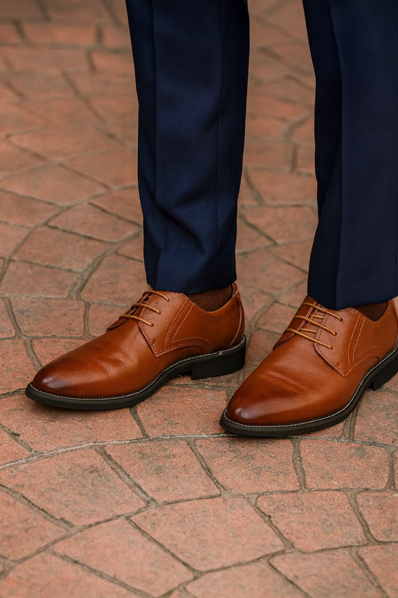 Men's leather Oxford dress shoes side profile showing smooth upper and rubber sole