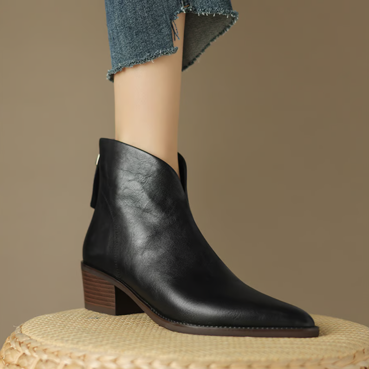 Pair of women's leather ankle boots with block heel, flat lay view
