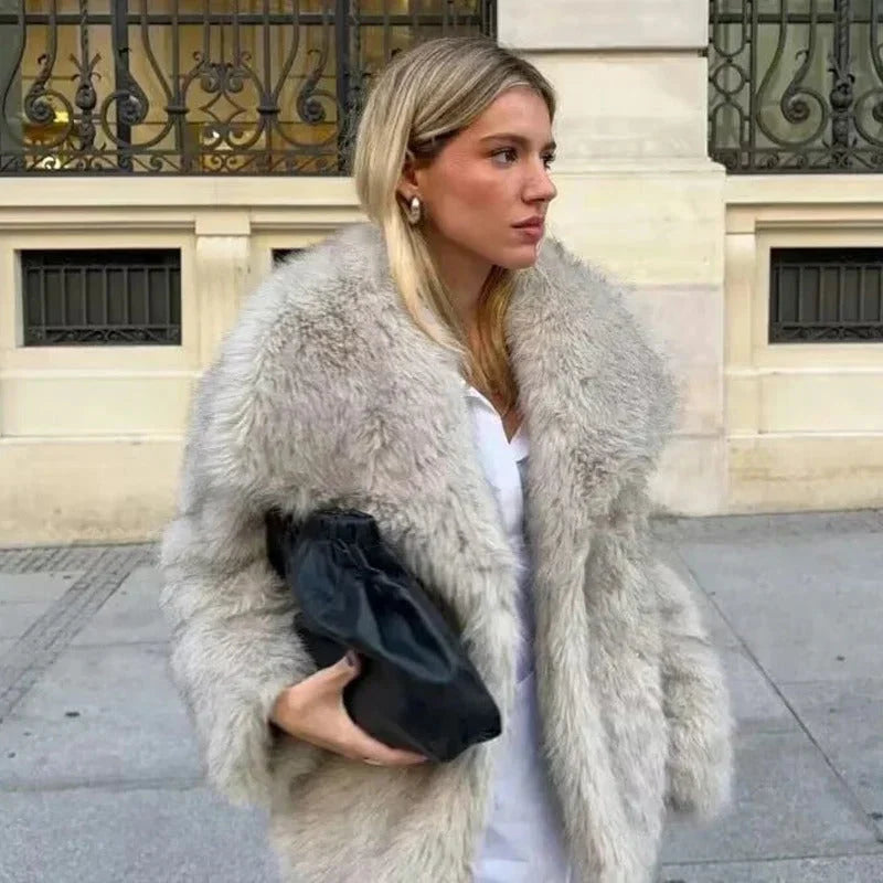 Side view of women's faux fur jacket showing relaxed silhouette and hip-length cut