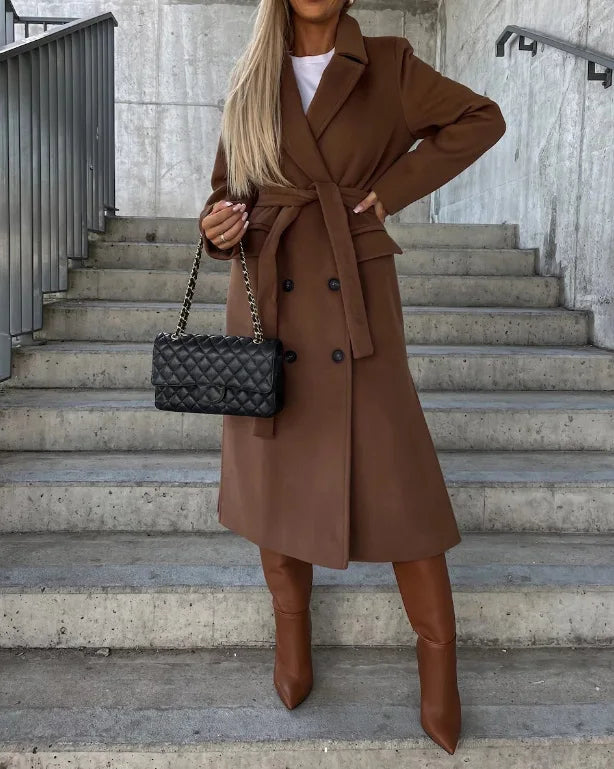 Tailored long coat for women with structured silhouette and button placket