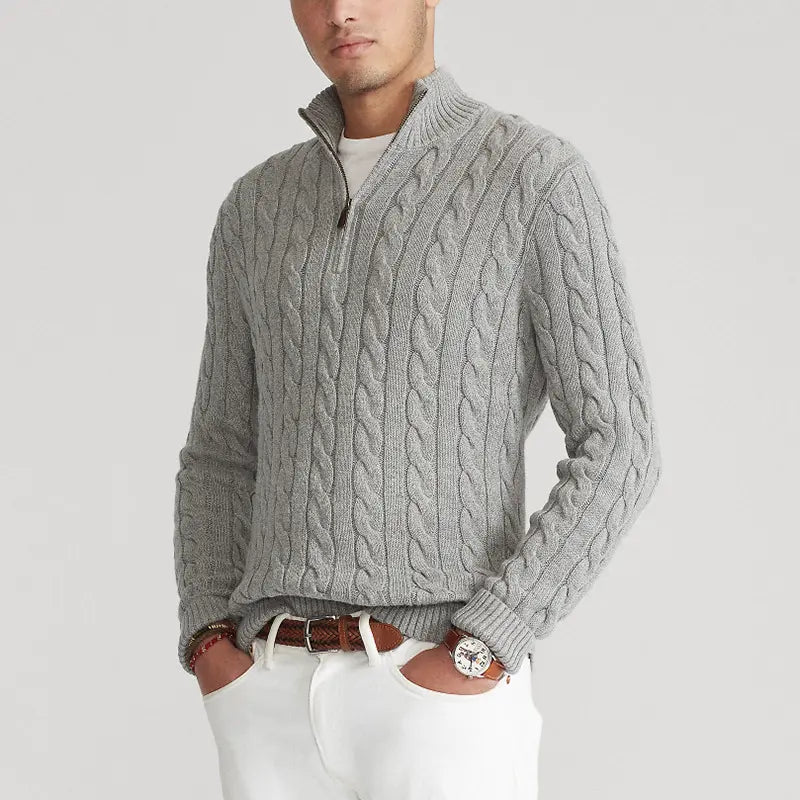 Cable-knit men's sweater with quarter-zip closure and ribbed stand collar, full-length sleeve detail