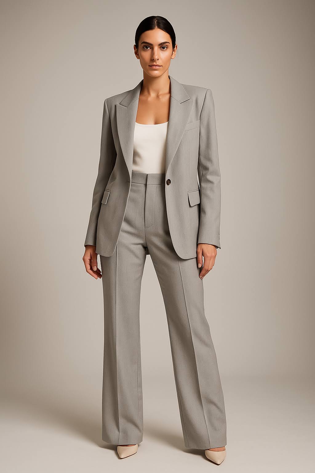 Women's professional tailored suit set with blazer and coordinating straight-leg trousers