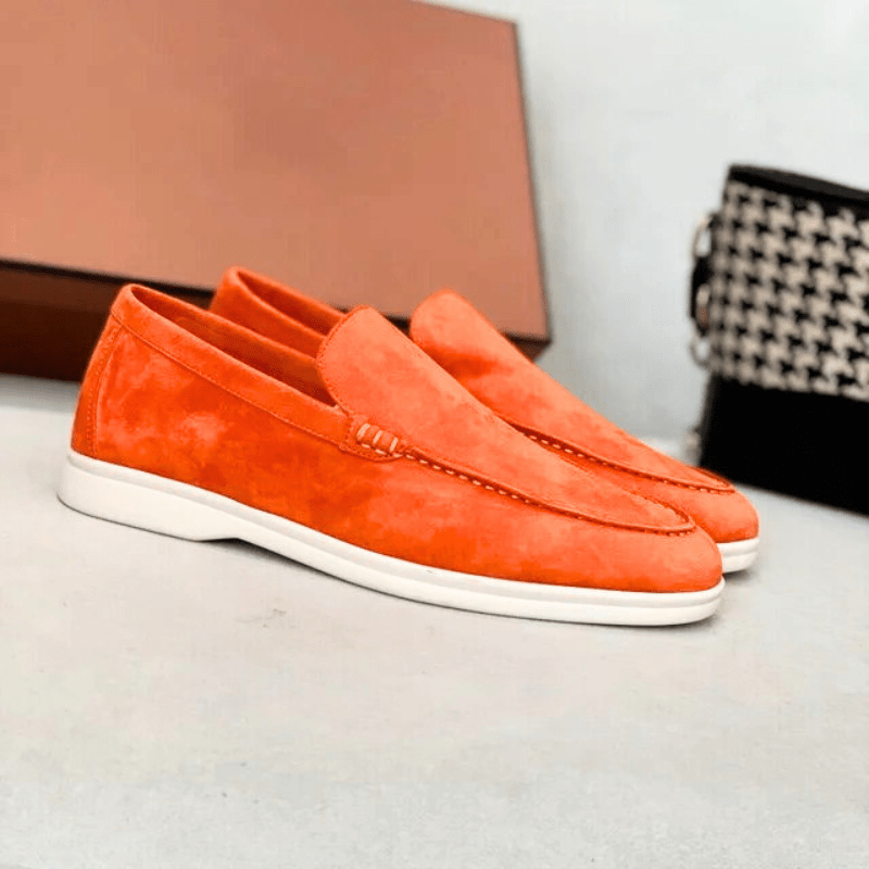Men's suede loafers in a dark colorway – three-quarter angle view