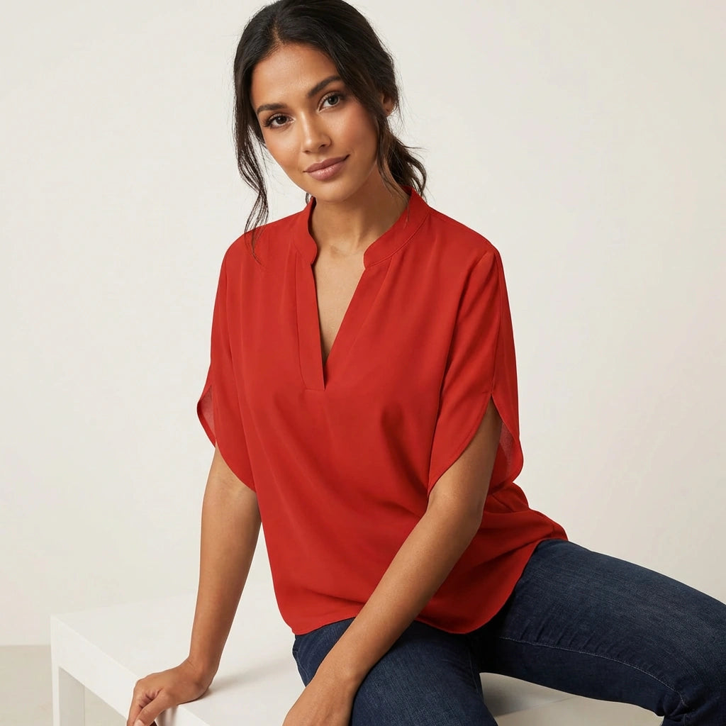 Women's lightweight woven V-neck blouse with slit neckline detail and short sleeves