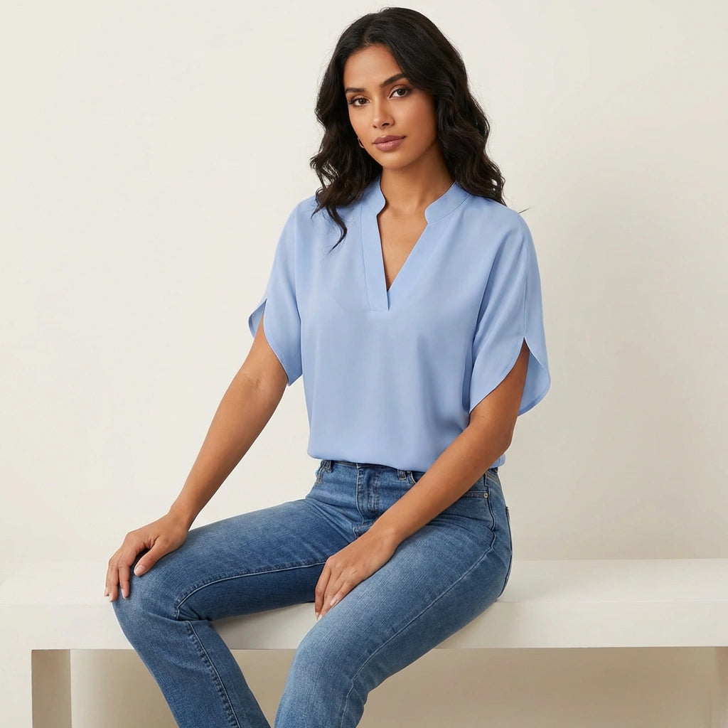 Women's short-sleeved blouse with V-neckline slit and lightweight woven construction