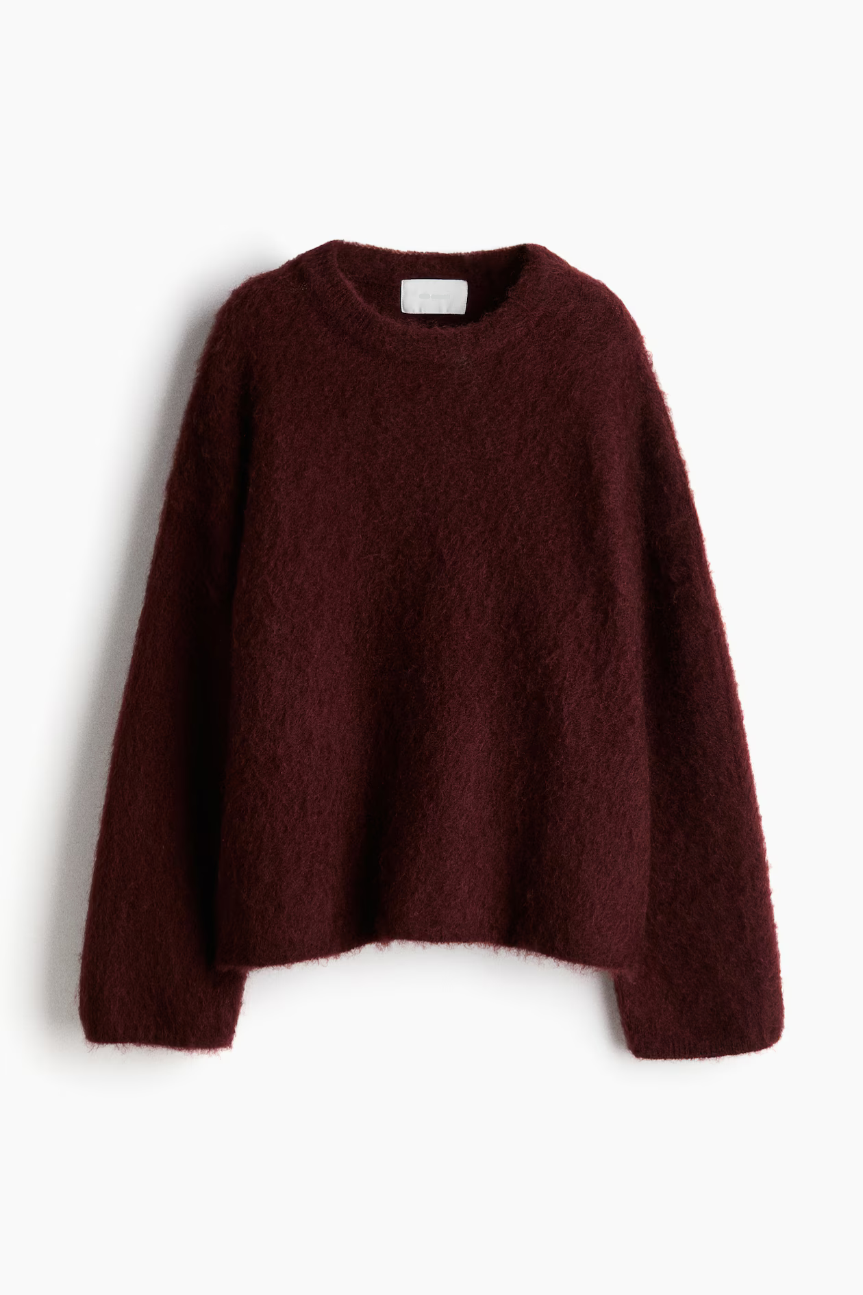 Women's soft fuzzy knitted sweater with round neck and relaxed fit