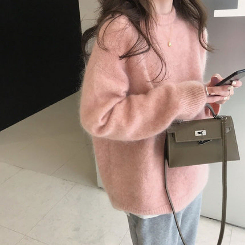 Women's knitted sweater styled for casual everyday layering