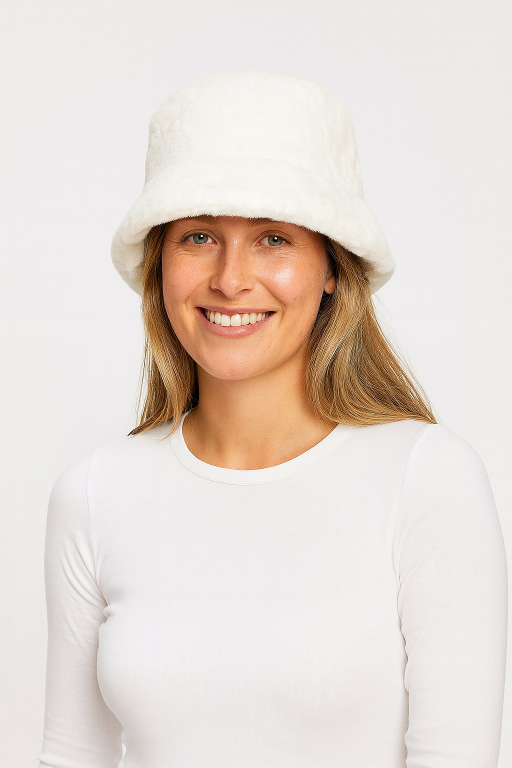 Women's faux fur bucket hat with soft plush texture, front-facing view