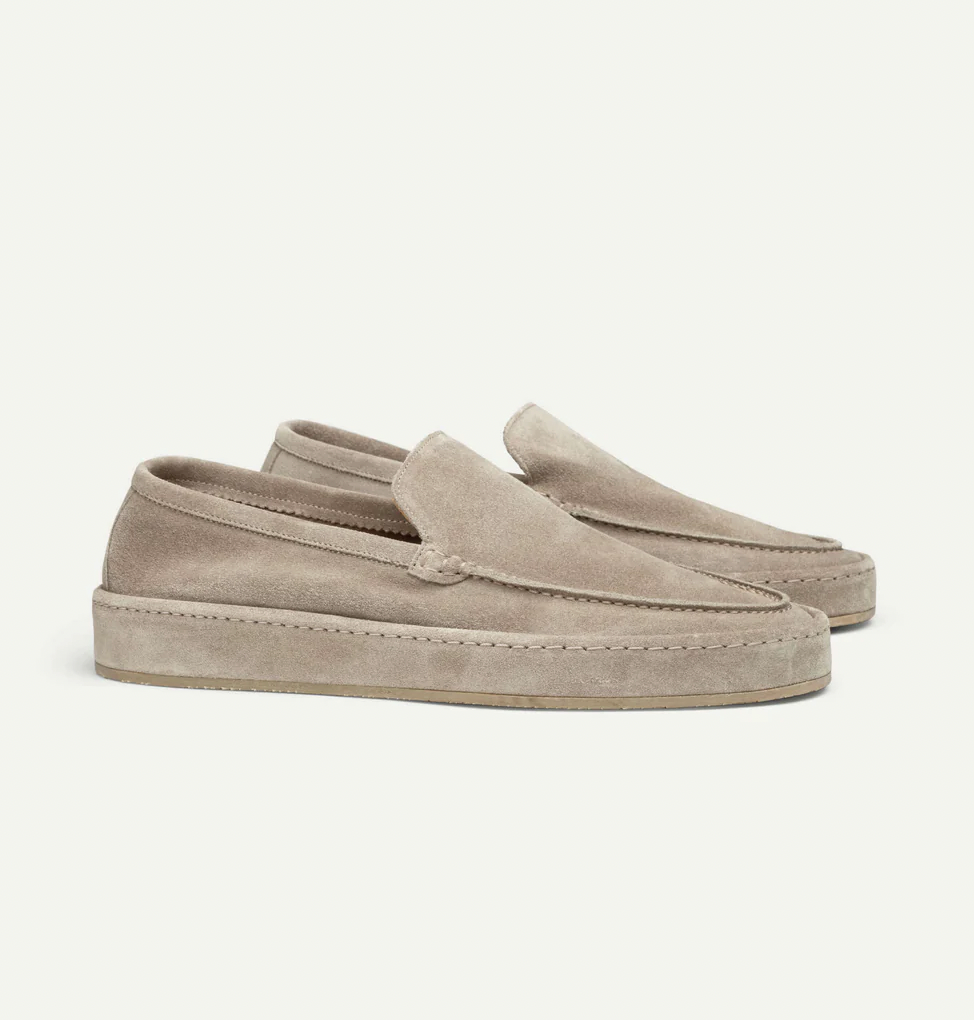 Men's classic suede slip-on loafers in brown, front three-quarter view