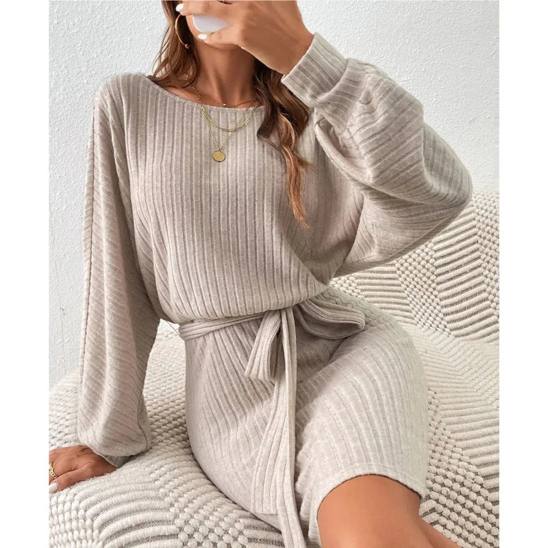 Short ribbed knitted dress with tie waist belt and narrow cuffs