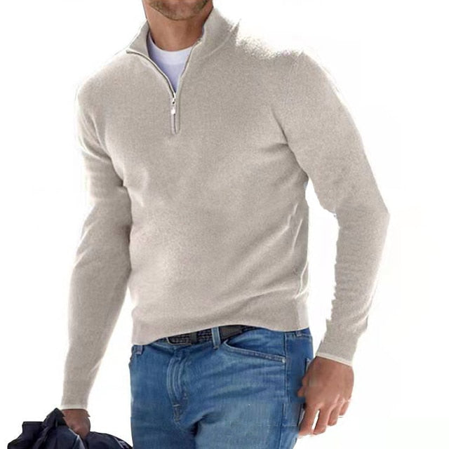 Men's wool-blend half-zip sweater shown from a three-quarter angle, highlighting the ribbed collar and zip detail