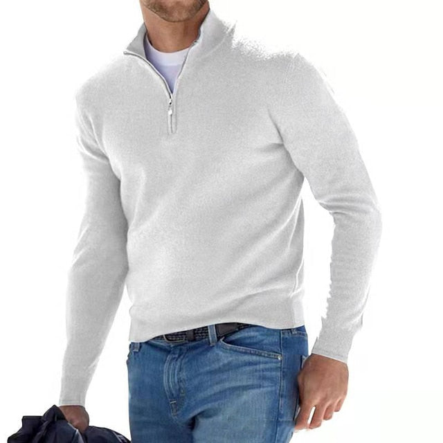 Men's wool-blend half-zip sweater worn in a lifestyle setting, showcasing the high collar and regular fit