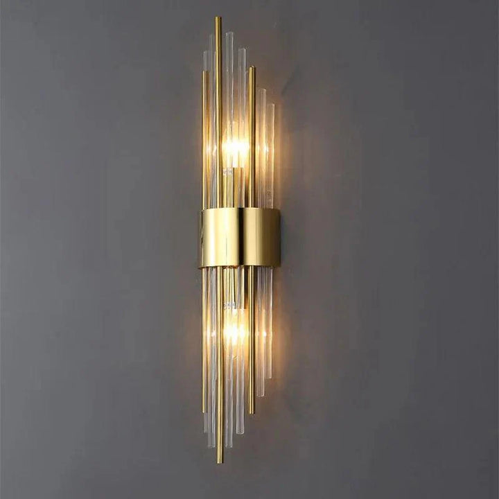Metal and glass wall lamp with a vertical structure, designed for indoor wall mounting