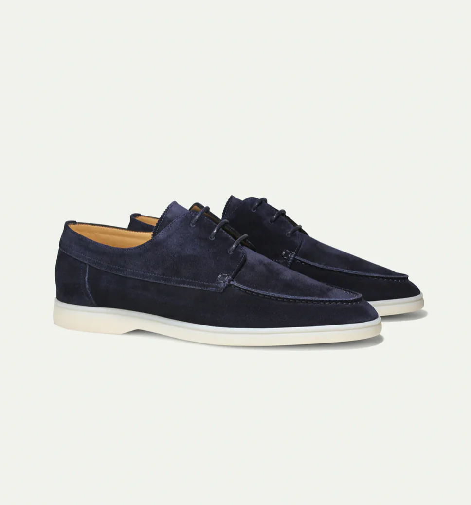 Men's suede lace-up loafers showing smooth lining and low-cut profile