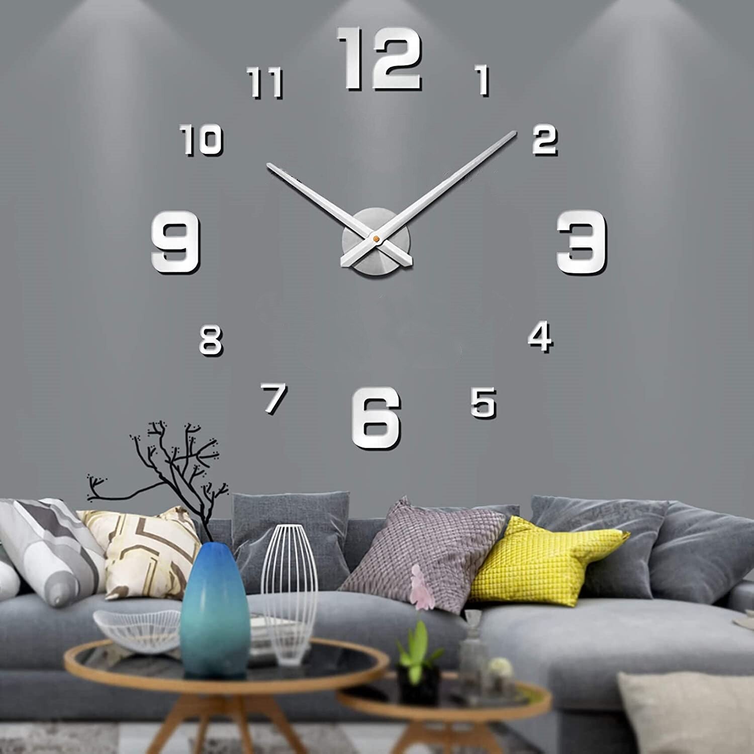Modern wall clock with bold numeral design mounted in a styled interior setting