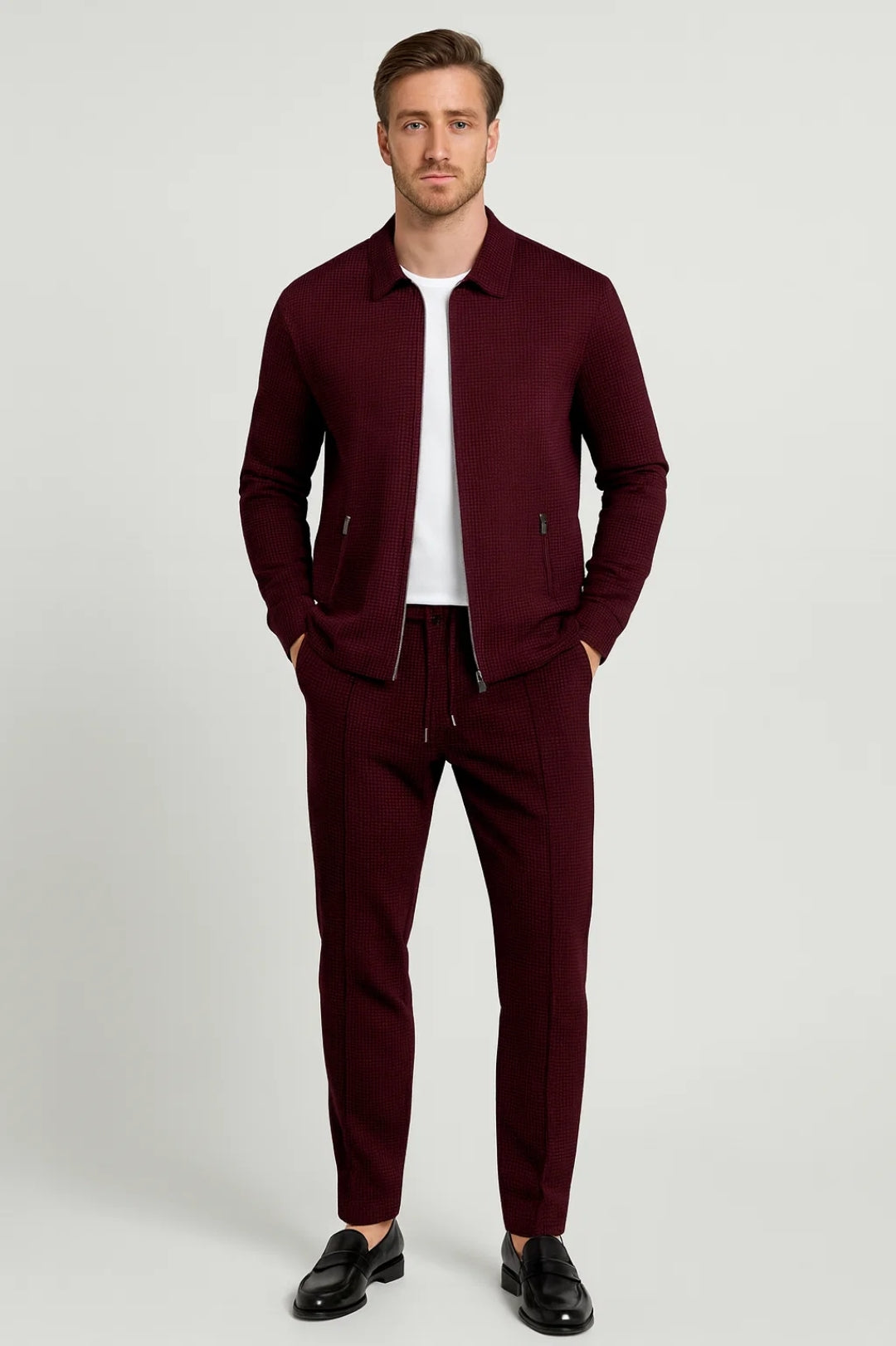 Men's textured zip-up jacket and tapered pants set with structured collar and drawstring waist