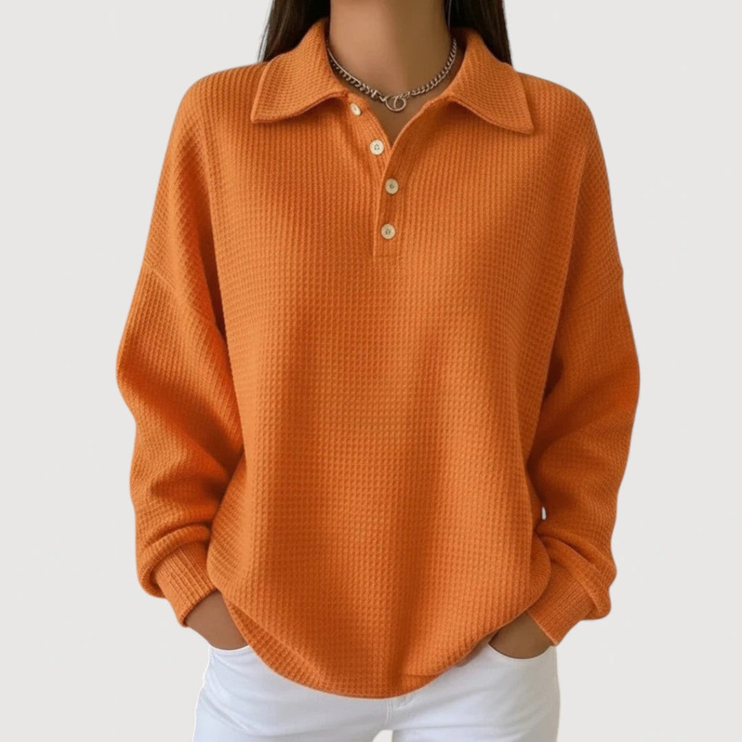 Women's waffle-knit sweater with classic collar and rounded hem
