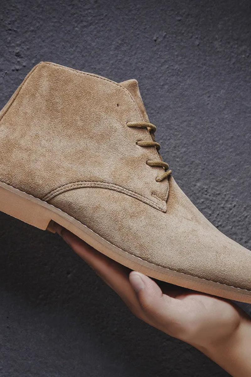 Men's suede desert boots — sole view showing lightweight flexible outsole