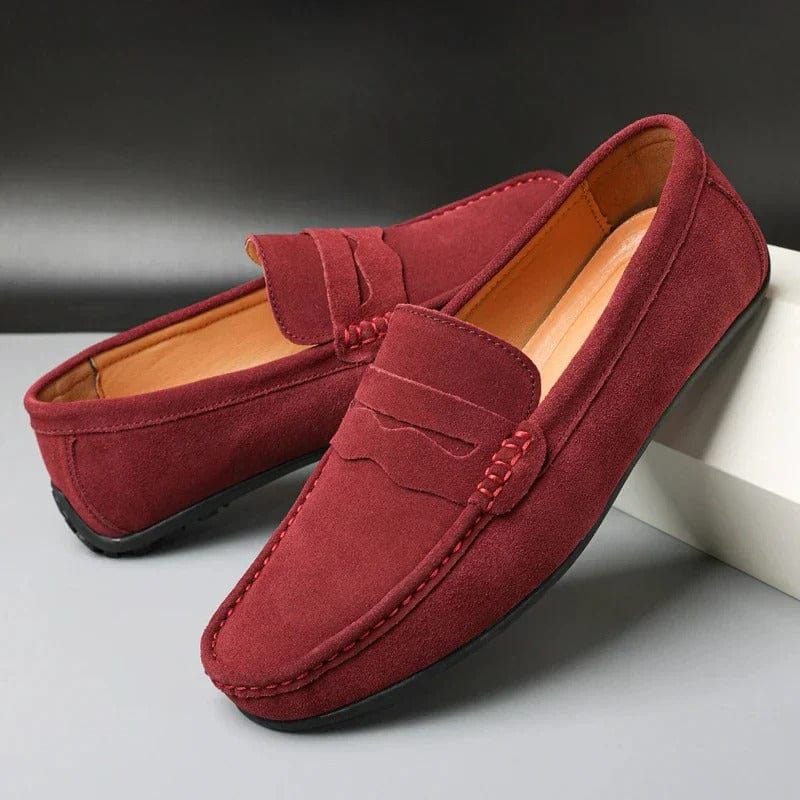Men's suede loafers rubber outsole close-up — grip and sole construction