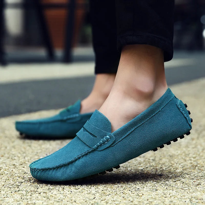 Men's black suede loafers with rubber sole — front three-quarter view