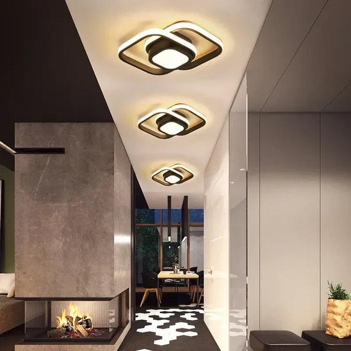 Round black modern LED ceiling light with double ring design, ceiling-mounted view