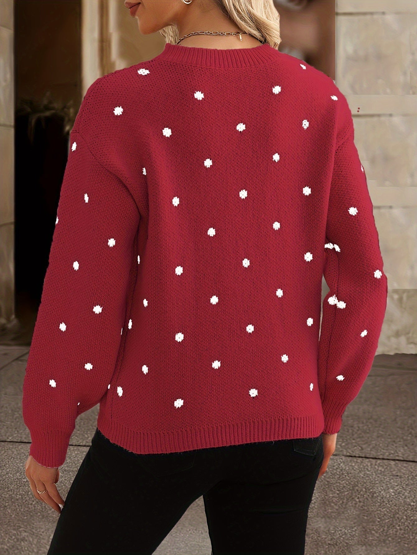 Women's knit sweater with subtle dot pattern, side profile view