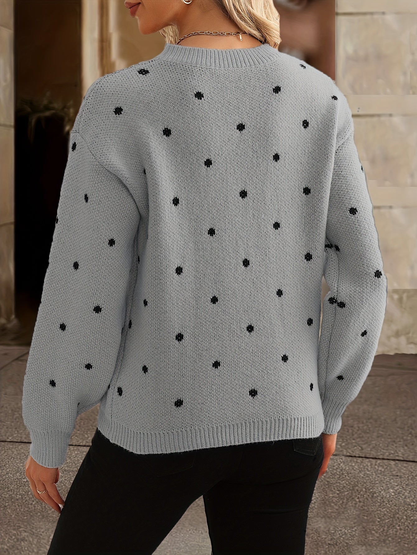 Women's crew neck knit sweater with dot pattern, styled outfit view