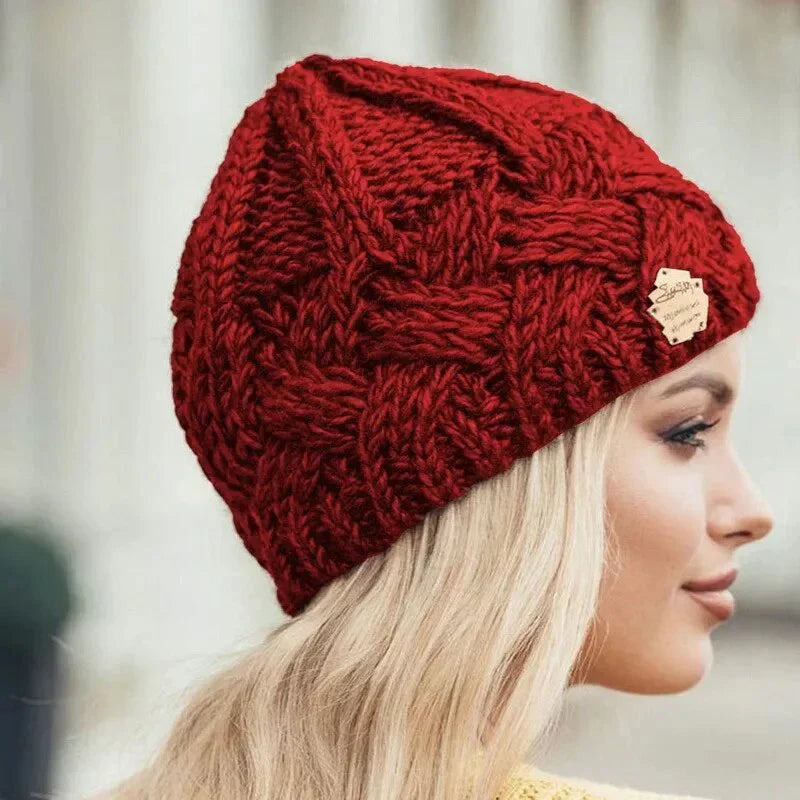 Women's acrylic knit winter hat styled with a slouchy silhouette for cold weather