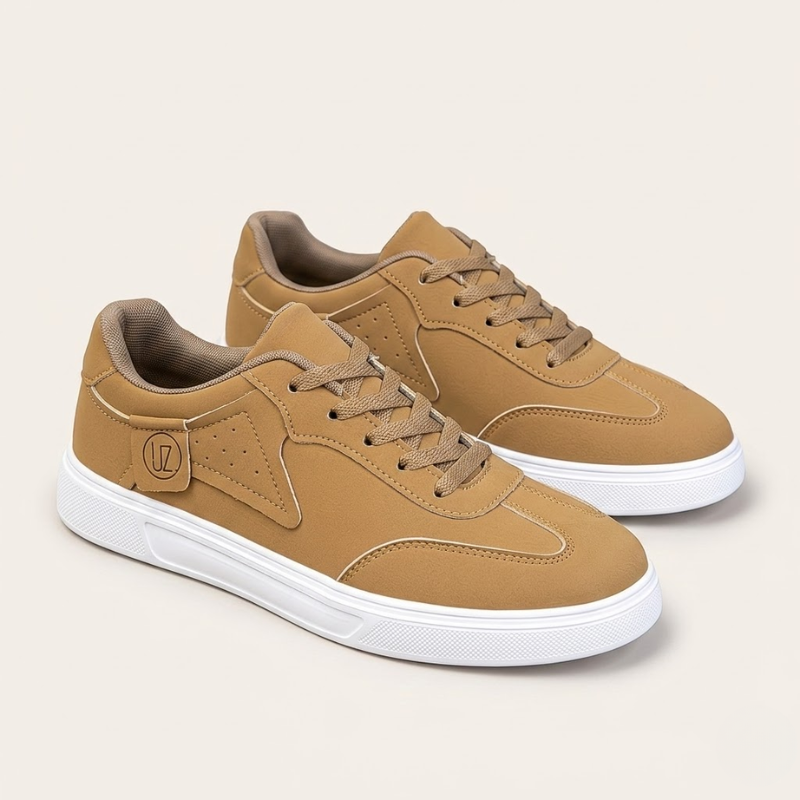 Men's low-profile suede sneakers with sewn panel construction and patterned rubber outsole