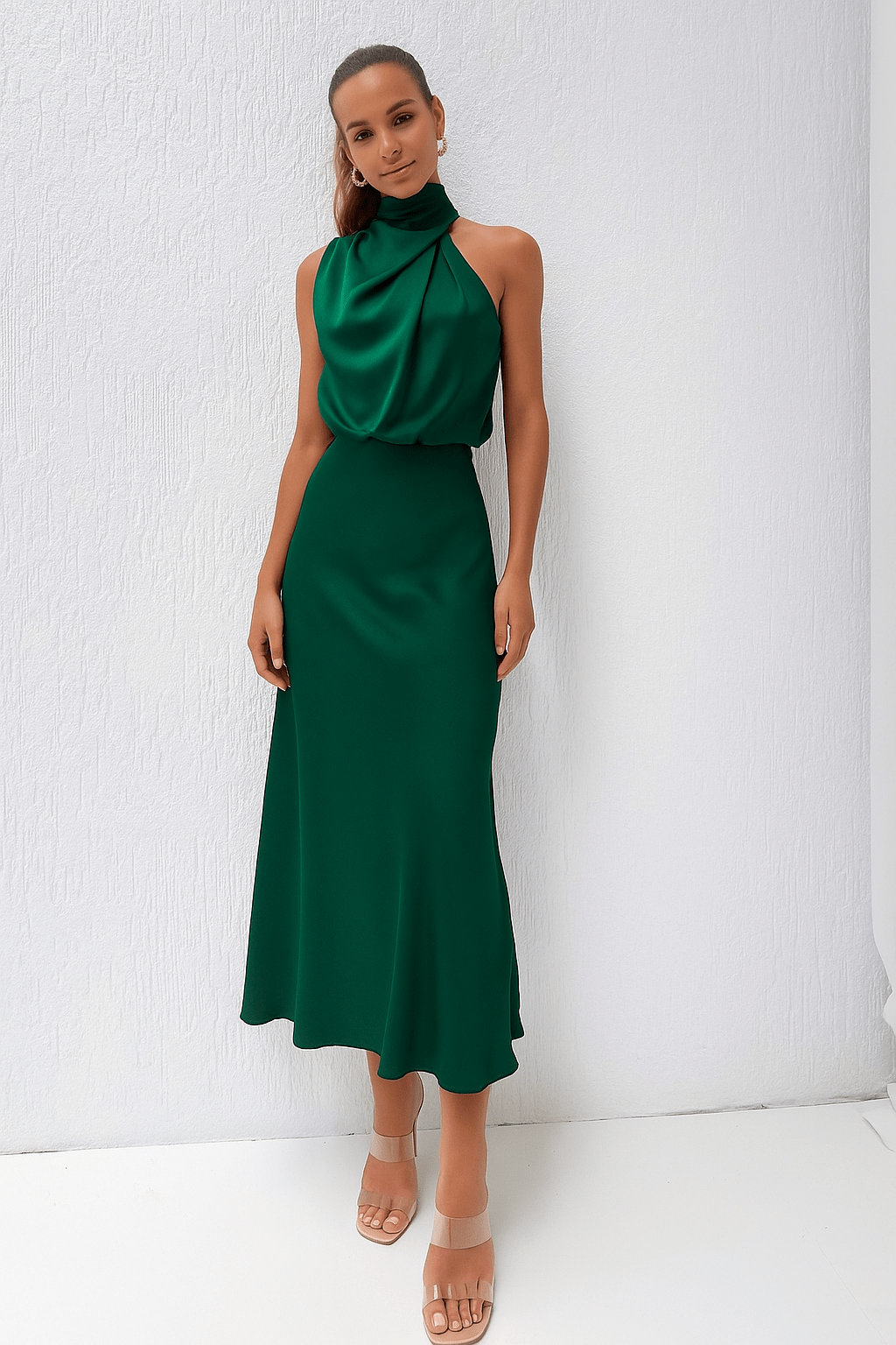 Women's satin halterneck midi dress with a smooth surface and balanced sleeveless silhouette