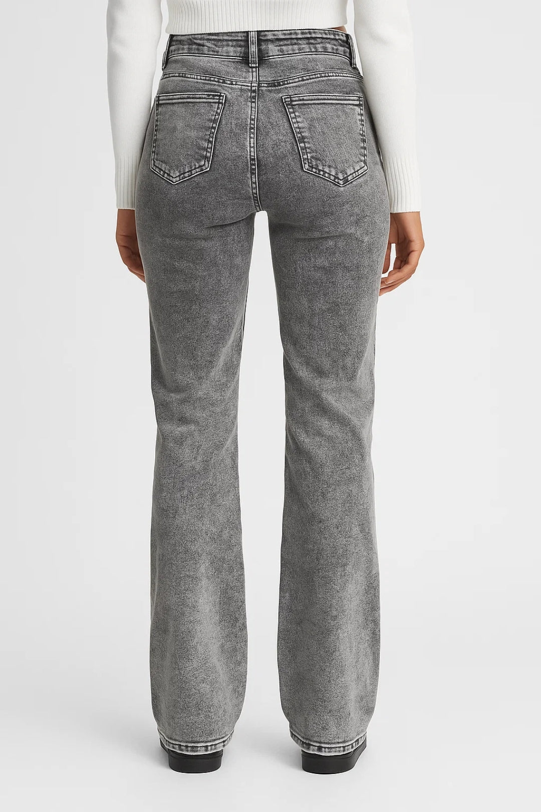 Women's straight-leg jeans in washed denim with mid-to-high waist and belt loops
