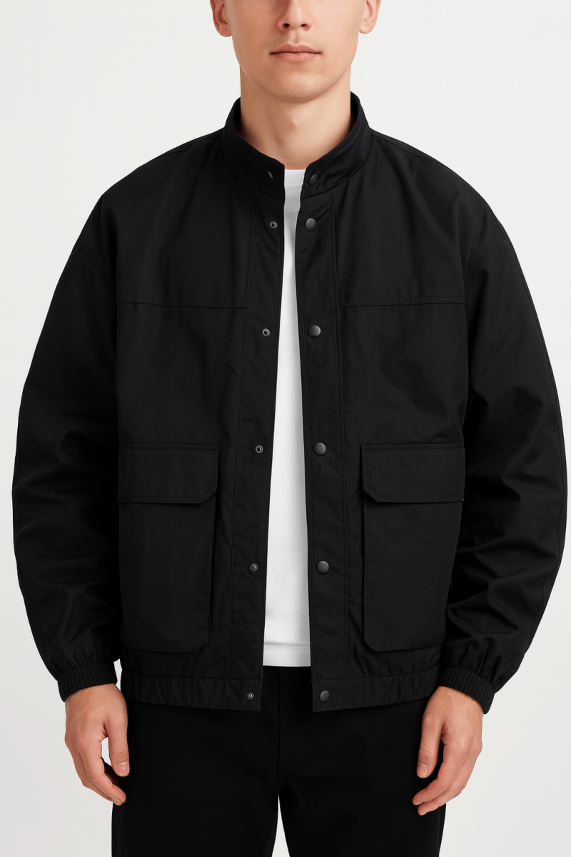 Men's minimalist jacket with snap buttons, stand-up collar, and front pockets