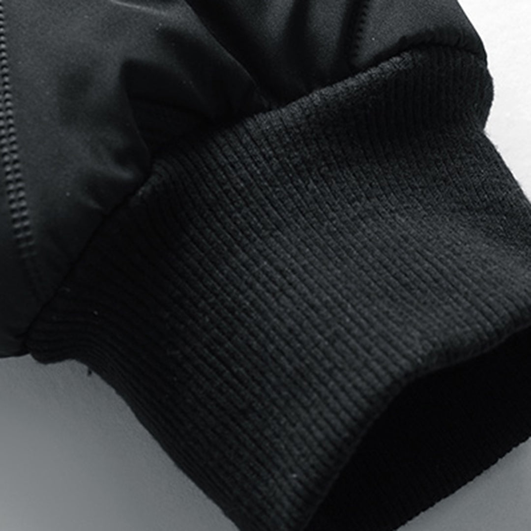 Men's black quilted puffer jacket – front view with zipper closure and stand-up collar