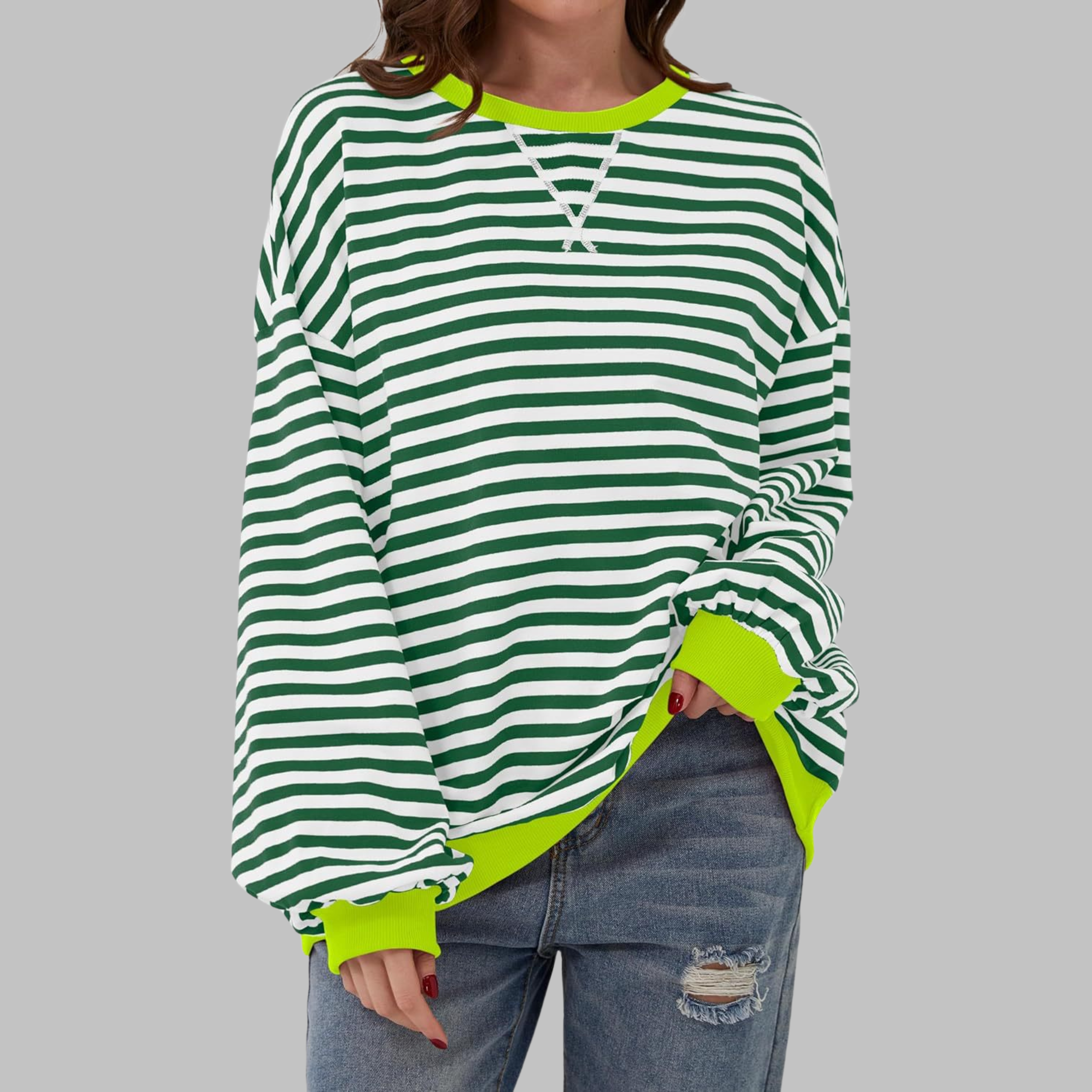 Striped oversized women's sweatshirt with contrast-colored cuffs and hem, long sleeves and relaxed fit