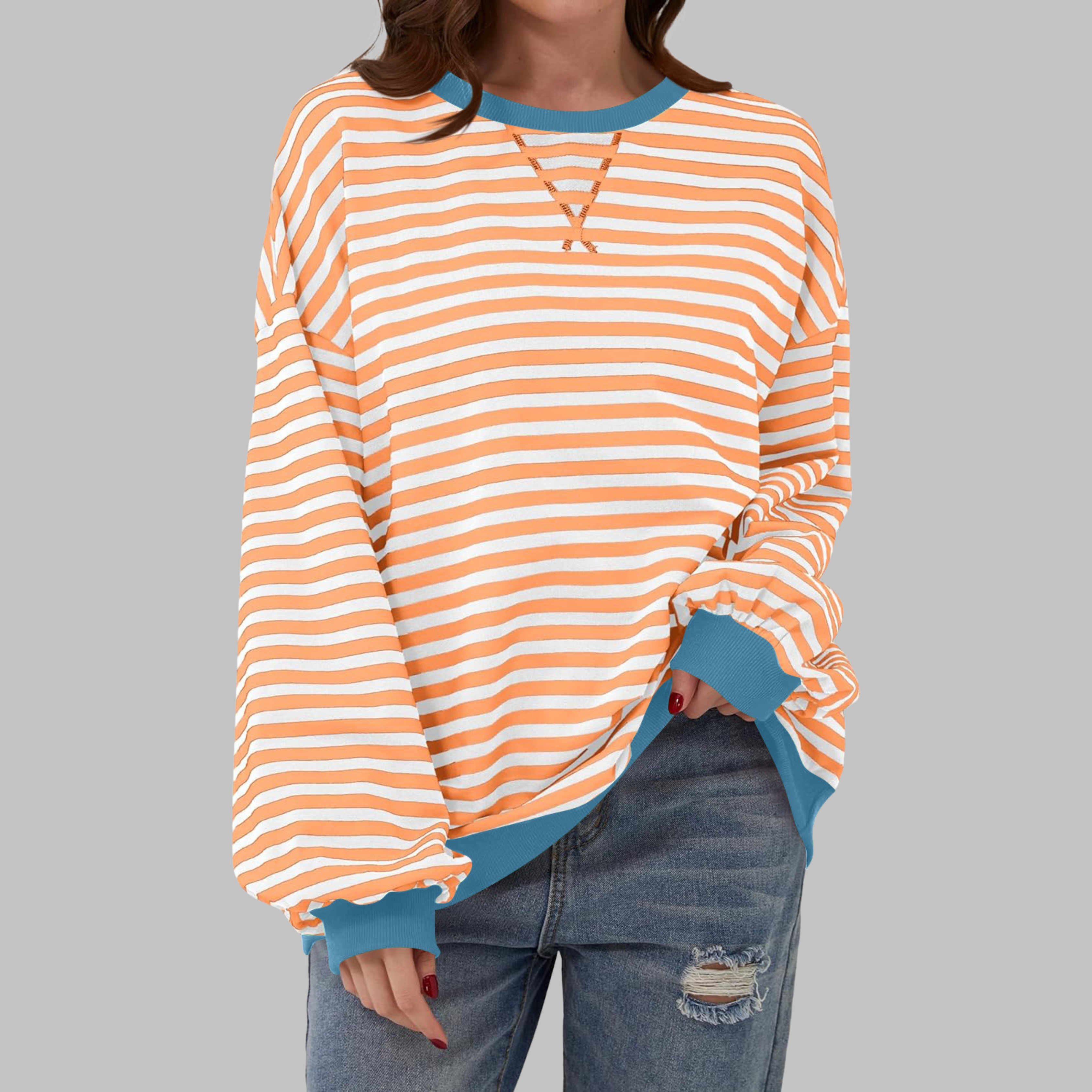 Women's striped sweatshirt with contrast-colored hem and cuffs, oversized fit and round neckline